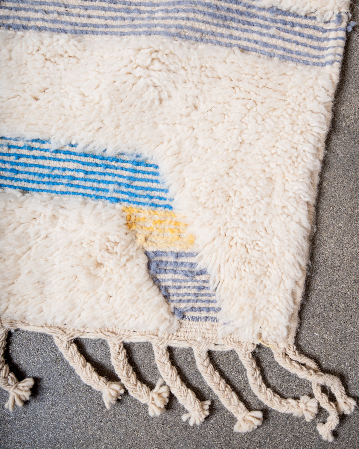 Modern, designer, handcrafted Berber rug from Morocco. Beniourain carpet with beautiful colours and patterns and fluffy wool texture.